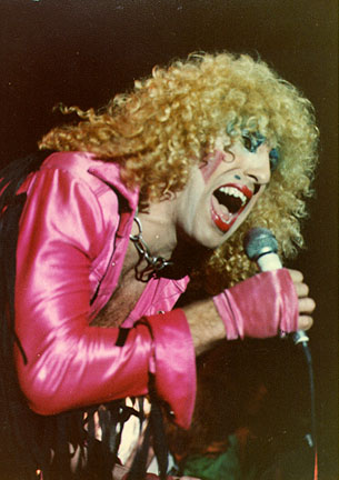 Is he singing through that microphone or eating it?