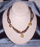 3 rows brown glass with vintage yellow stations