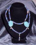opalite glass with 2 vintage blue cabachons