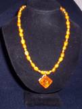 orange freshwater pearls and faux amber pendant