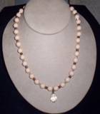 vintage peach plastic beads with glass beads