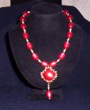 vintage red moonglow beads and vintage earring as drop