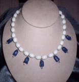 vintage white plastic with vintage blue tulip beads