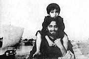 Apu (Soumitra Chatterjee) and his son in " Apur Sansar "