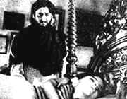 Apu (Soumitra Chatterjee) and his son in " Apur Sansar "