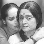 Indrani (Mamata Shankar) and Maya (Ruma Guha Thakurtha) in " Ganashatru "
