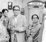 Dr. Gupta (Soumitra Chatterjee),  Maya (Ruma Guha Thakurata),  Haridas Bagchi (Dipankar Dey), Indrani (Mamata Shankar) in " Ganashatru "