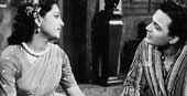 Uttam Kumar and Suchitra Sen in " Pathe Holo Deri "