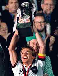 Klinsmann lifting up the trophy of EURO 96!