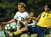 Dmytrulin takes the ball away from Klinsmann