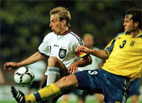 Dmytrulin takes the ball away from Klinsmann