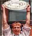 Klinsmann holding the trophy of Bundesliga