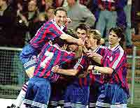 Klinsmann and his teammates celebrating the winning of the UEFA Cup