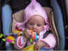 oliviaeatinghertoys.jpg (137792 bytes)