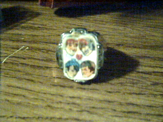 The first pic on my ring has all four Monkees heads on it