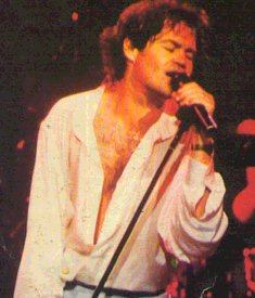 Micky singing in concert