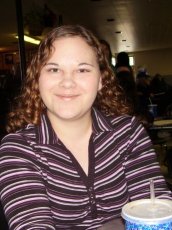 Nicole at the bowling alley...waiting her turn.