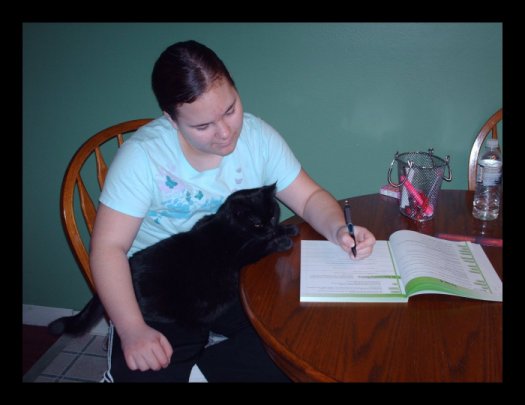 Picture of Nicole and Lizzy doing schoolwork....this picture was in the school newsletter!
