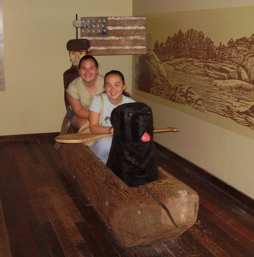 Nicole and Tia in the Lewis and Clark canoe at the Idaho Historical Museum during a school field trip.