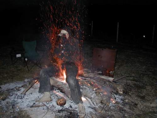 Hackenwerth winning $30 by sitting in the bonfire for 10 seconds!