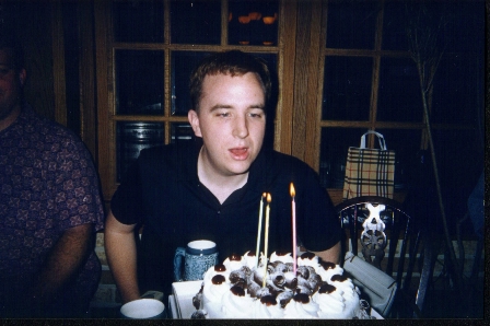 Obligatory shot of me looking silly while blowing out the three big candles