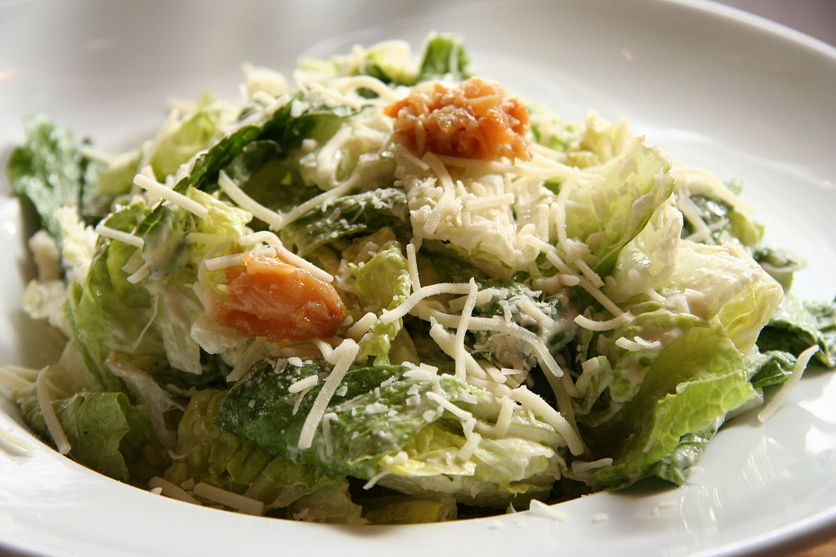A Ceasar Salad with croutons.