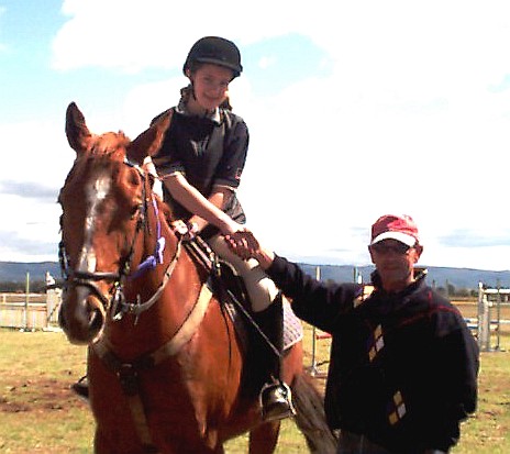 Success at Competition. Alice Johnson is congratulted by Olymic rider Jamie Coman after her win at the under 21 Showjumping.