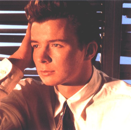 I Remember This Photo Shoot Very Well.&nbsp; The Promotions For His Australian Tour In 1989 Were Filmed Like This.&nbsp; Rick Poking His Eyes Through The Blinds And The Words "Rick Is Coming" Flashing Up On The Screen.&nbsp; Stupid Stuff We Remember Eh!