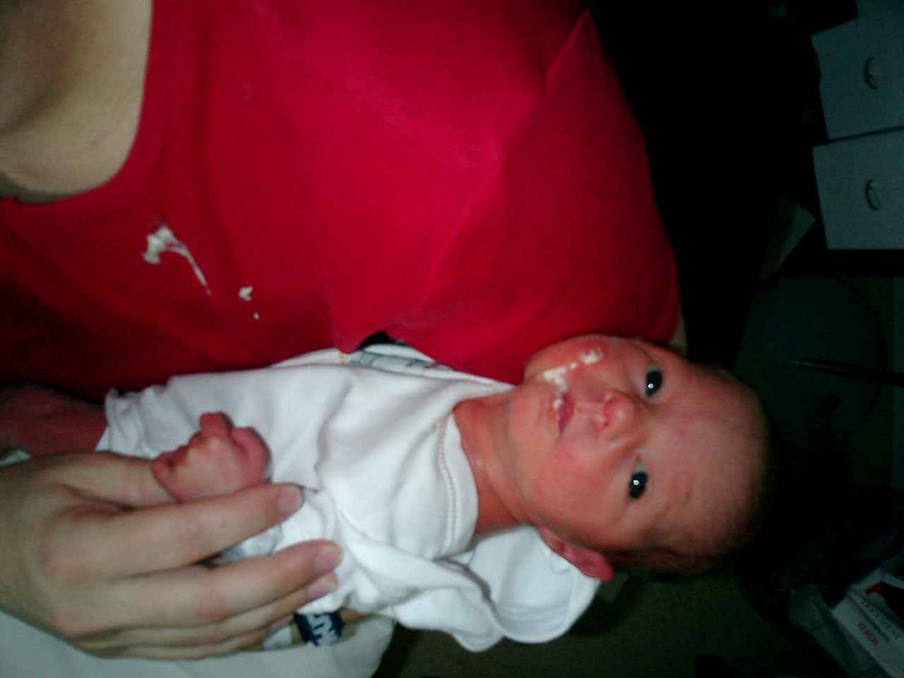 Even cute babies puke every so often. (But she doesn't make a fuss like me)