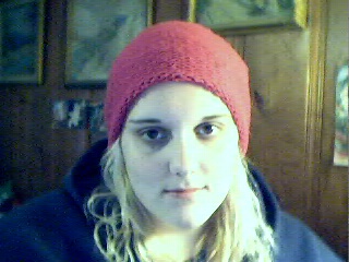 Meg in a cute hat... But I don't think she's too crazy about that one