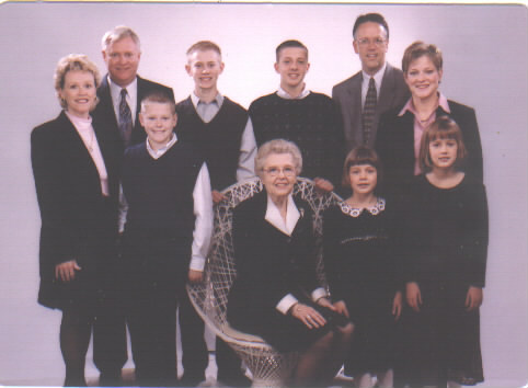 Formal dress family portraits in the studio.