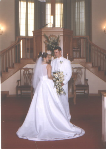 Couple posed at the alter