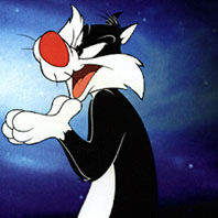 Sylvester waits in glee for Tweety. Sylvester � Warner Bros 