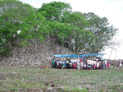 Maya Shaman's ceremony in the shadow of an unreconstructed temple