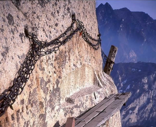  Be sure to hold on to the railing.