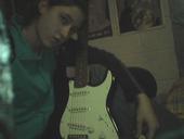 cell phone...gotta love it...this is me and my Fender Squier (its blue)