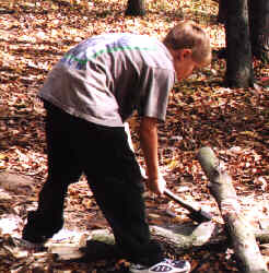 Mike Sattler shows proper axe 
technique for chopping firewood