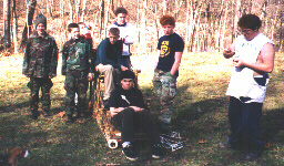 troop 476 strikes a pose while
the dog eyes Cliff's dinner!