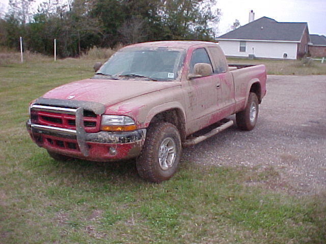 Click here to see some pics of my truck after some fun in the mud!