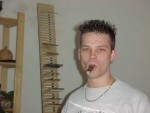 Andi_Zigarre_Mund_1k.jpg (5212 Byte)