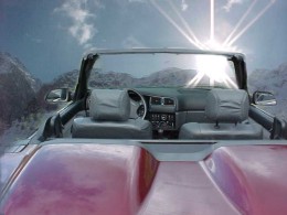 Cabrio_hinten_Berg_vor_Sonne_k.jpg (14231 Byte)