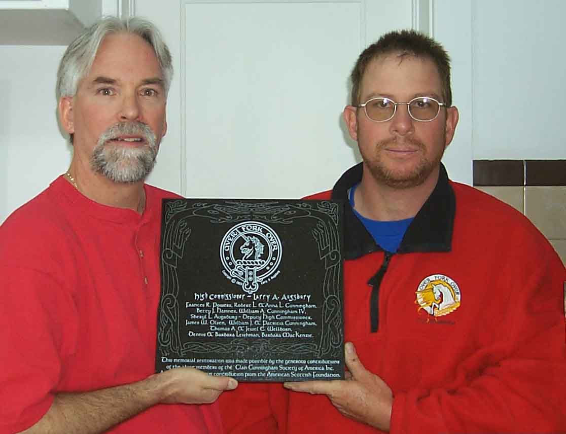 CCSA High Commissioner and Artist Adrian Dudley with finished plaque