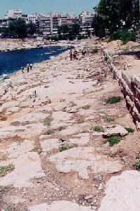 Shoreline with remains of walls and towers