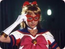 Sailor V taking her mask off