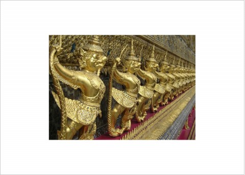Gold-leaf adornments outside Grand Palace building 