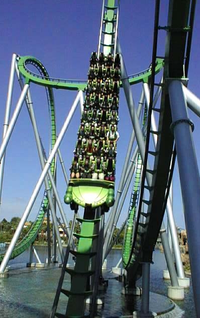 After exiting the first vertical loop, the train travels under a bridge at high speeds.
