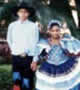 Foto 98 - Maykon e Carolina, Praça Cívica - Ano 2002