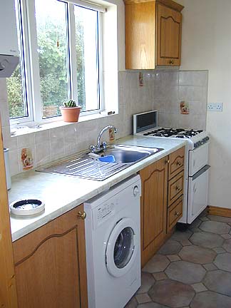 Kitchen - gas central heating and cooker.  Washing machine available for your use.
