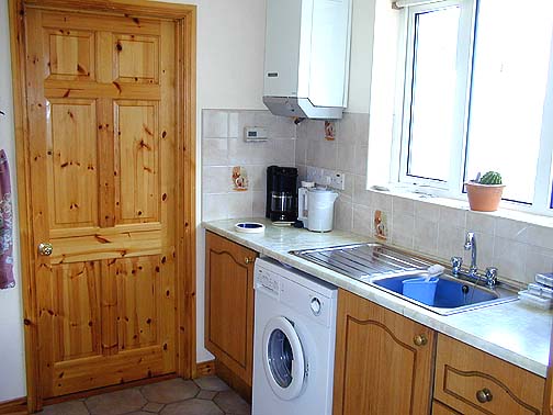 Fancy a sea view while doing the dishes?  The next photo reveals the scene!