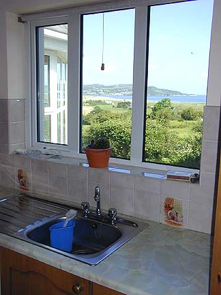 Superb views over Ballymastocker Bay - makes washing up a pleasure!